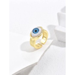 1 Anillo dorado con diseño de ojo